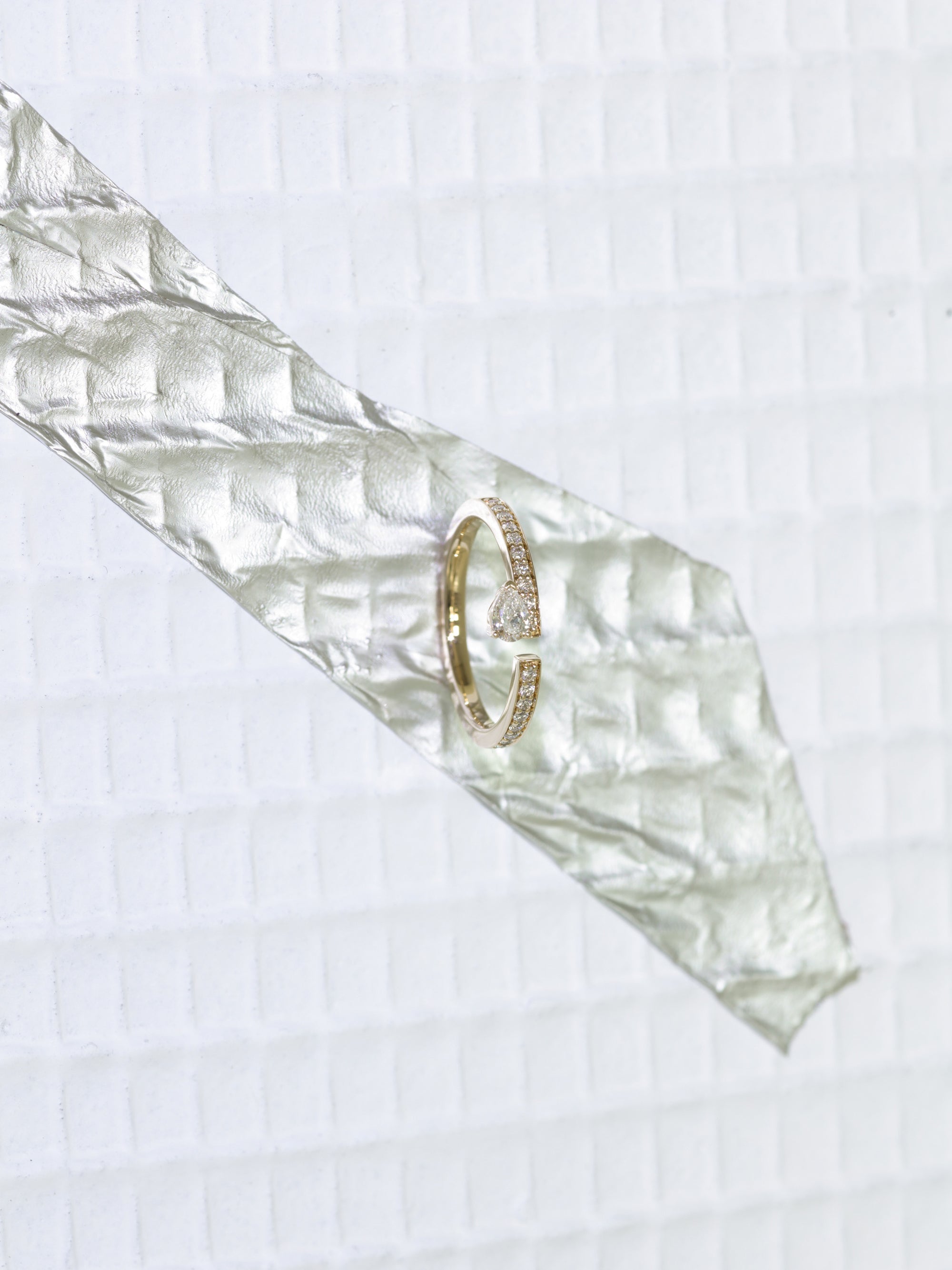 Floating Pear Diamond Split Ring 0.35