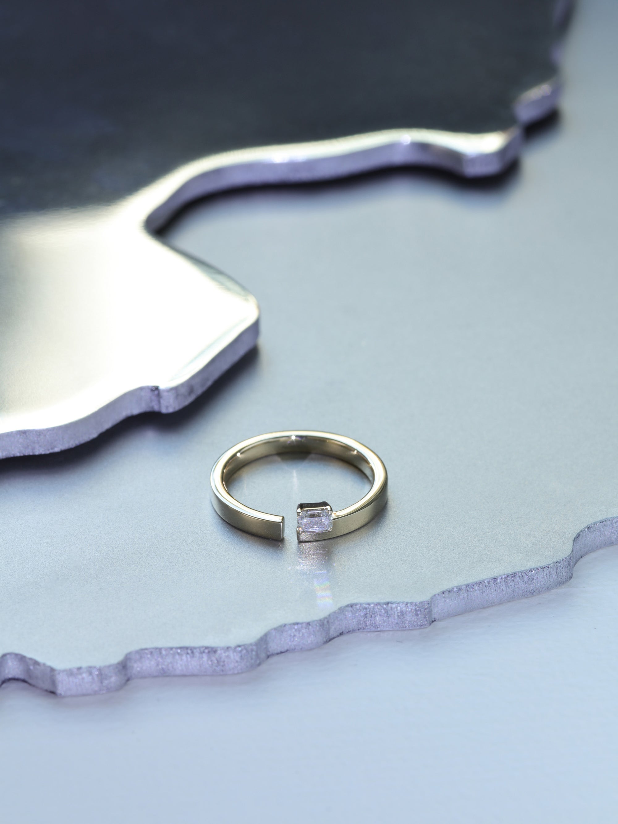 Floating Emerald-Cut Diamond Split Ring 0.20