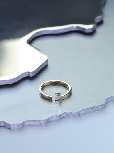 Floating Emerald-Cut Diamond Split Ring 0.20