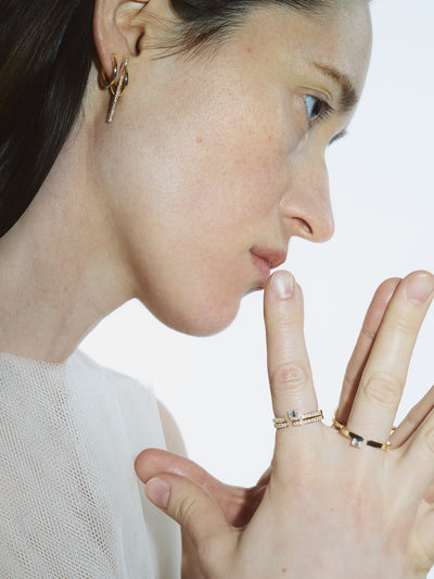 Floating Emerald-Cut Diamond Split Ring 0.35