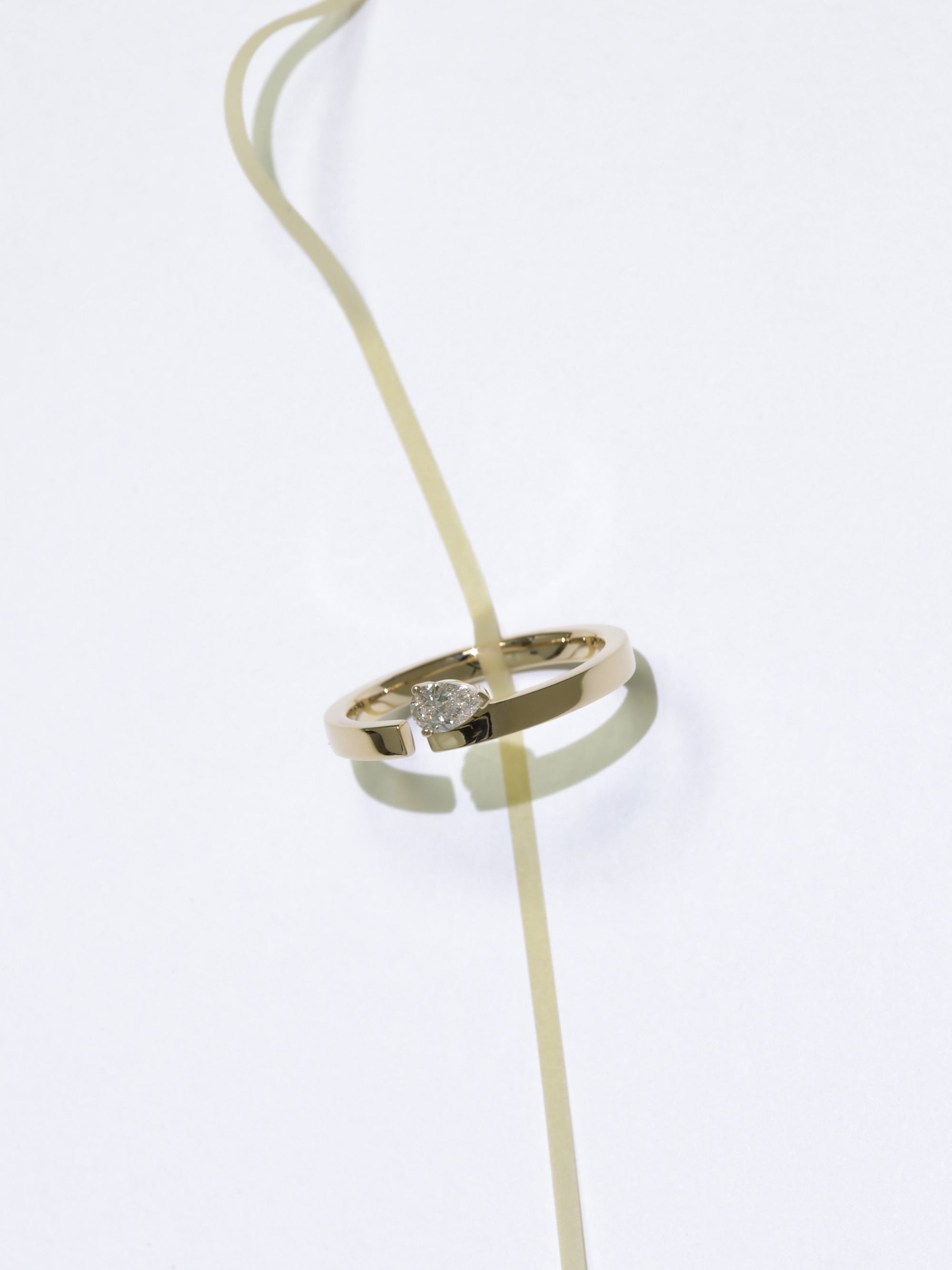 Floating Pear Diamond Split Ring 0.20