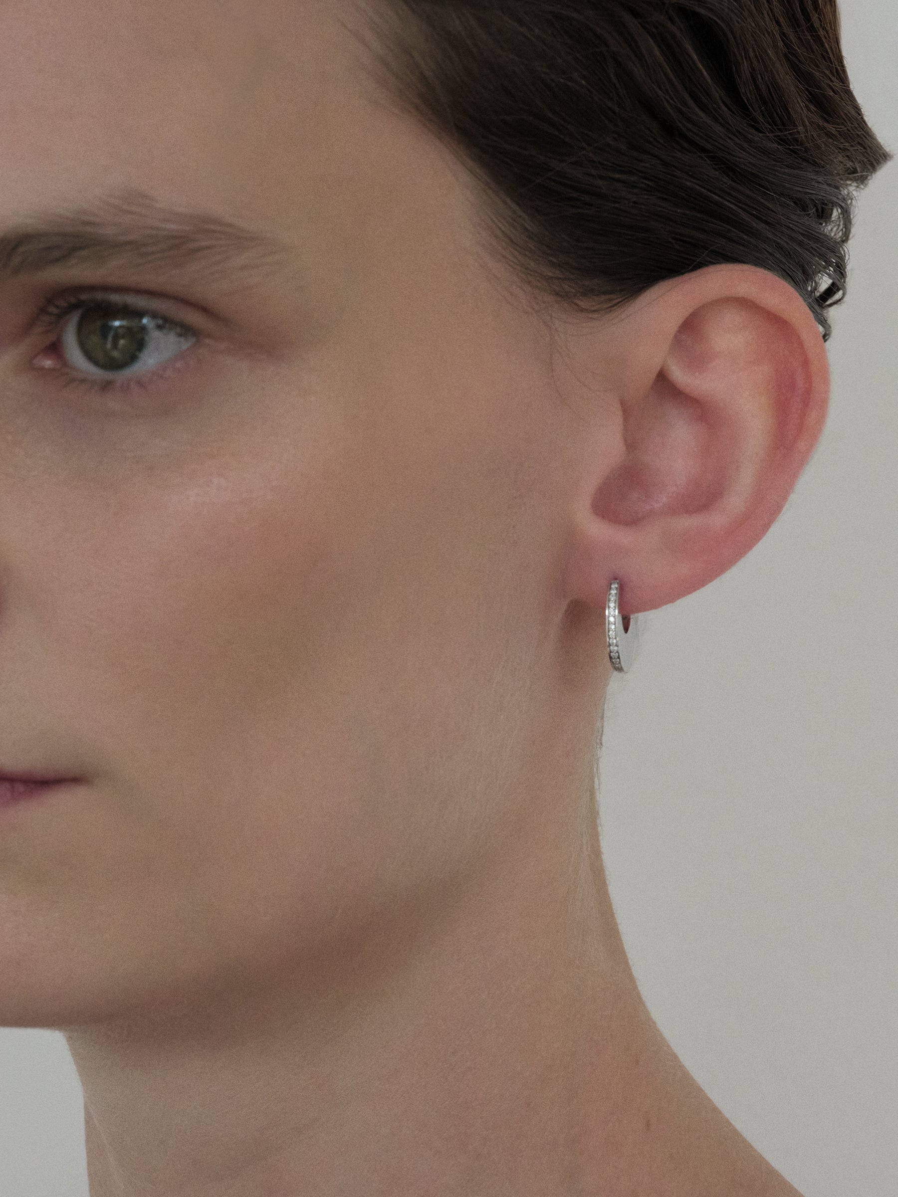 
        Elongated Mini Diamond Huggie Earring 0.08