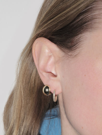 
            Elongated Mini Diamond Huggie Earring 0.08