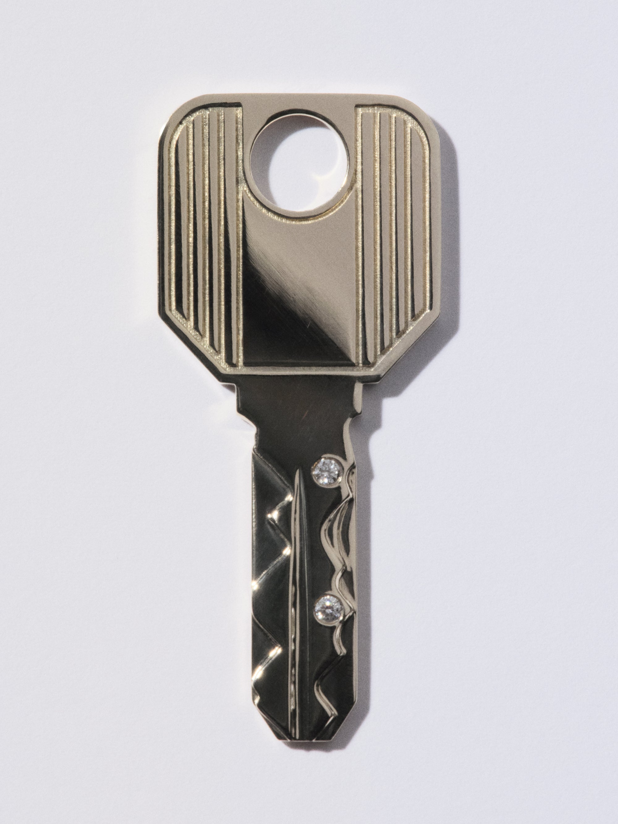 
        Gold Key Pendant 0.04
