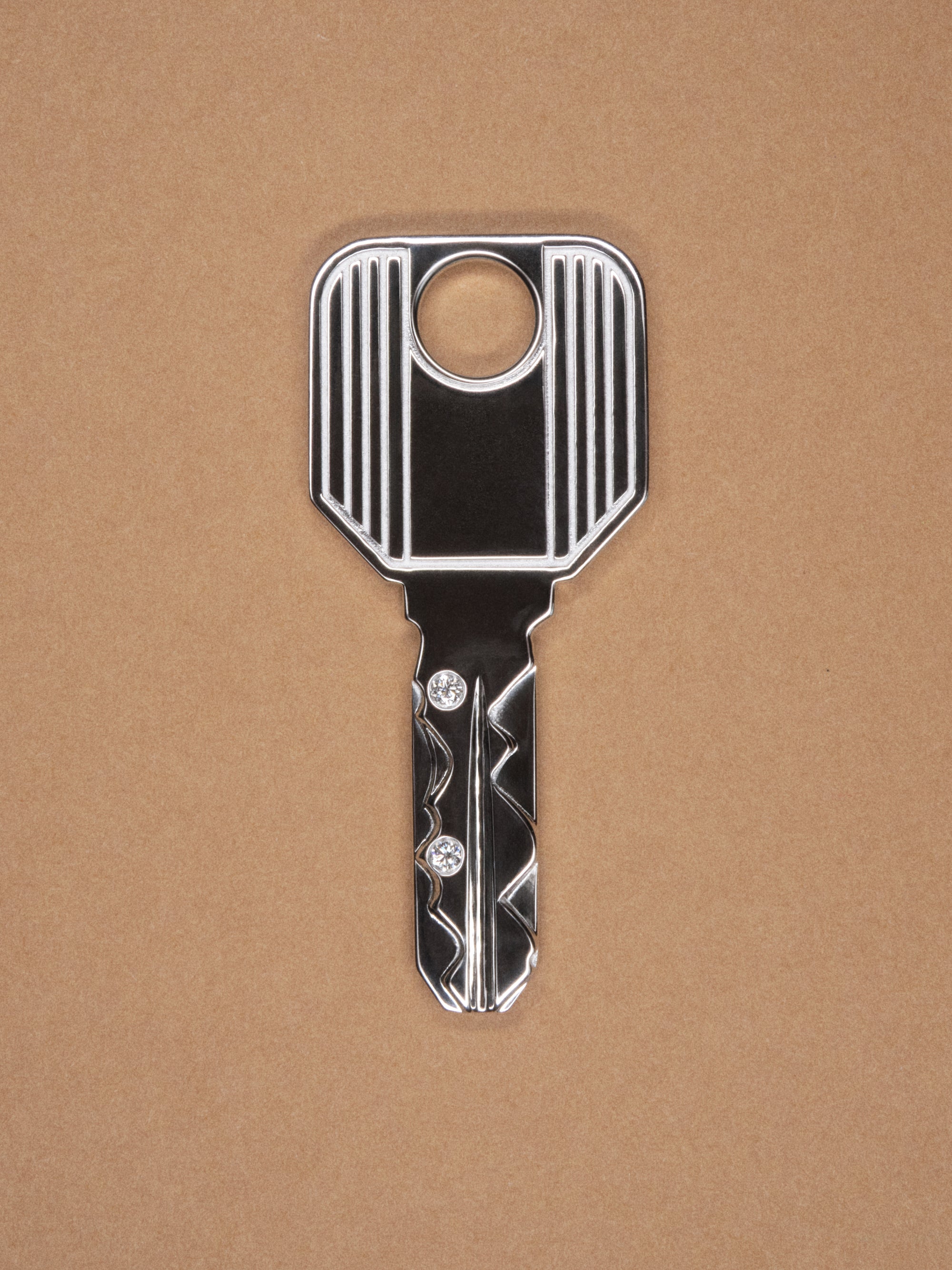 
        Mini Gold Key Pendant 0.02