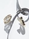 
        Floating Pear  Mini Diamond Huggie 0.07