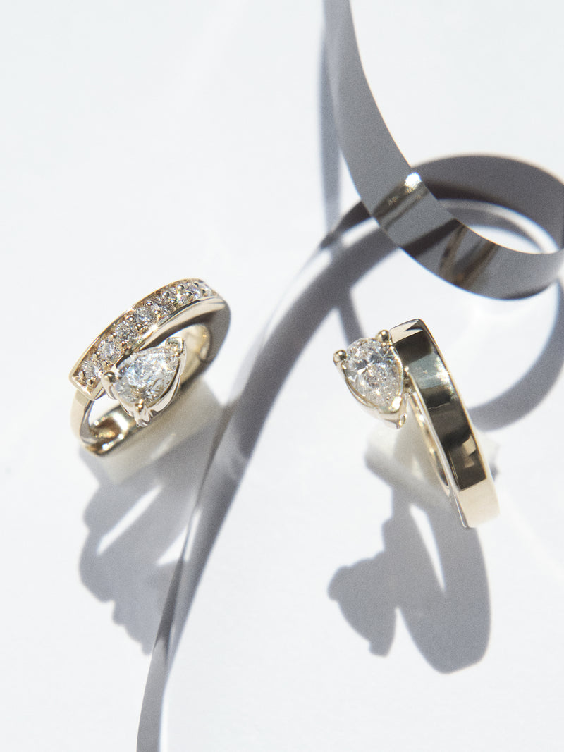 Floating Pear Diamond Mini Huggie 0.07