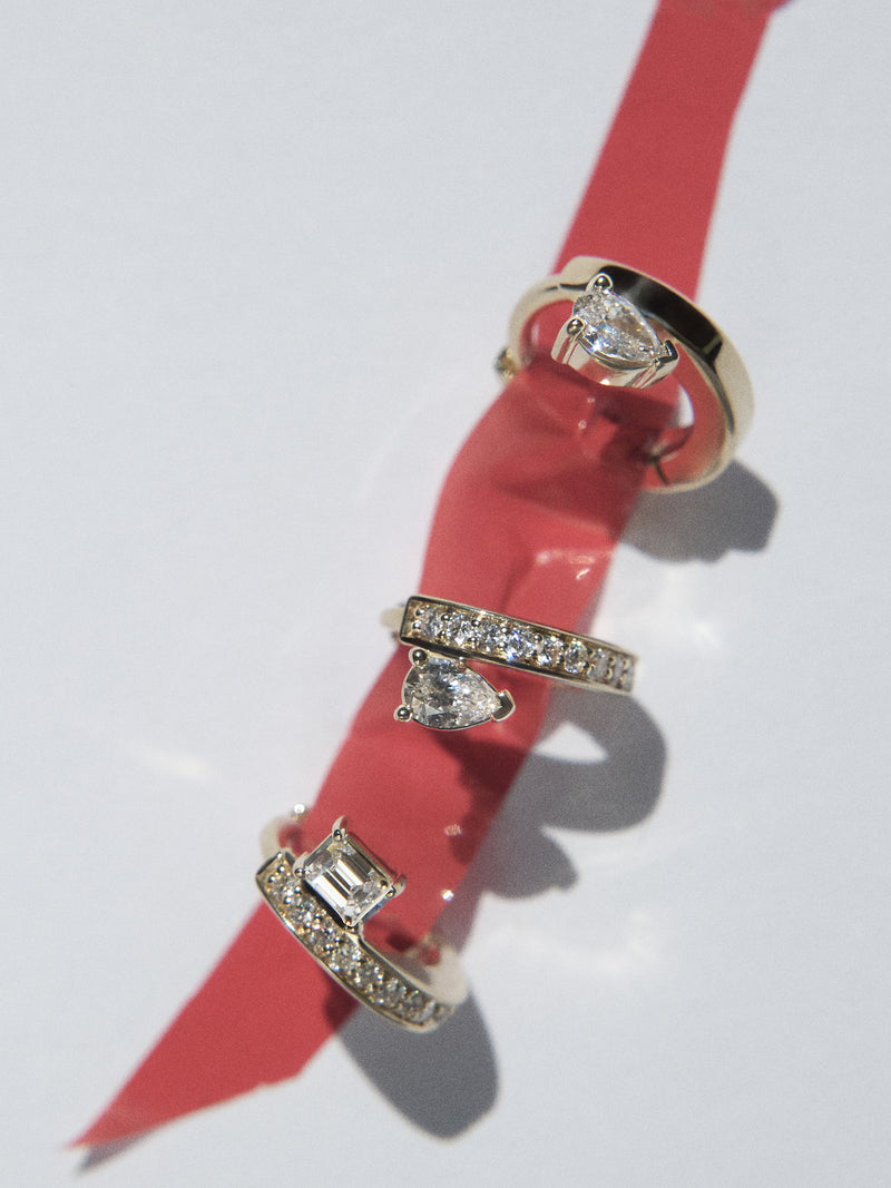 Floating Pear Diamond Mini Huggie 0.12